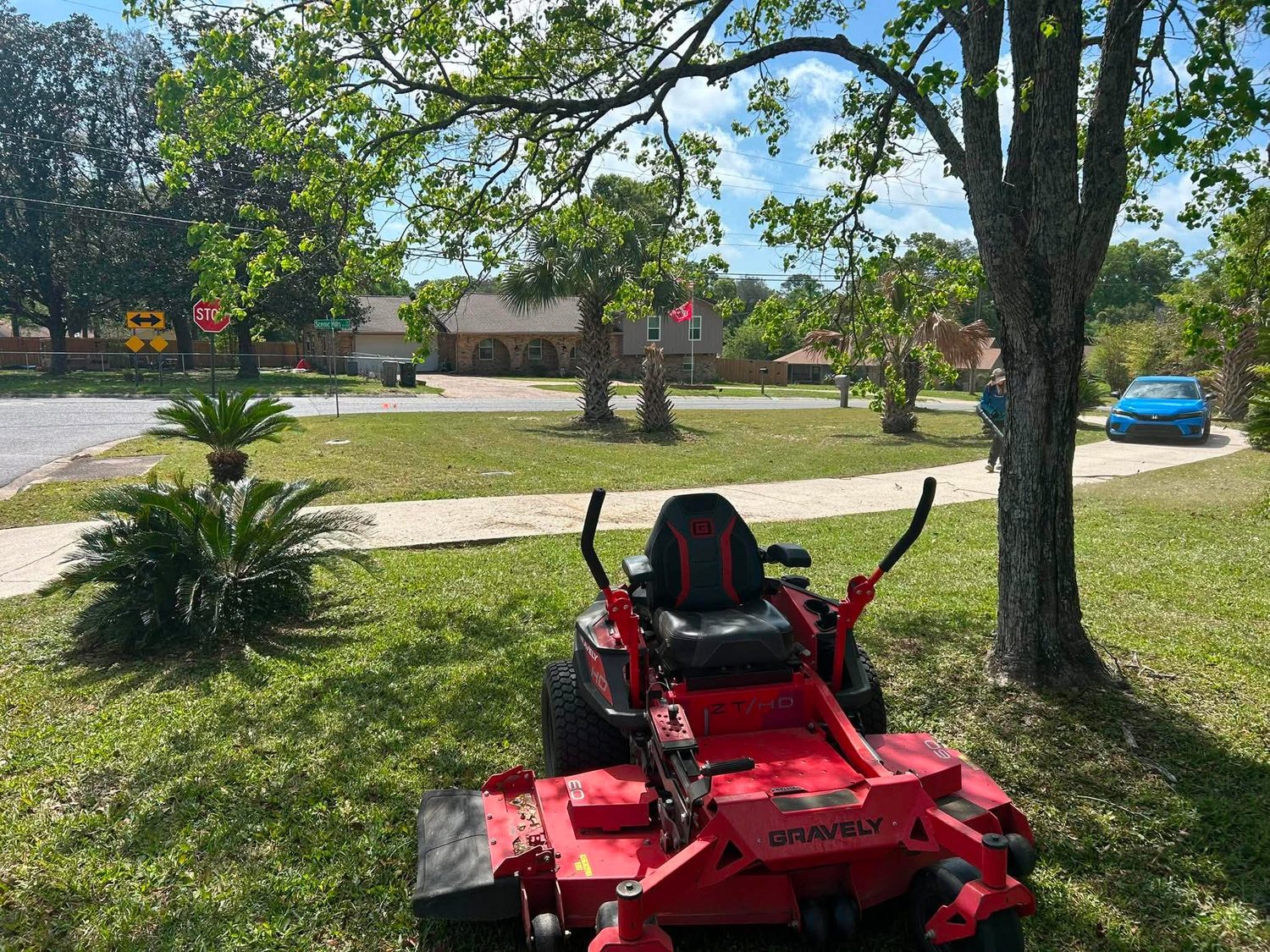 Zero-turn mower on a residential corner lot